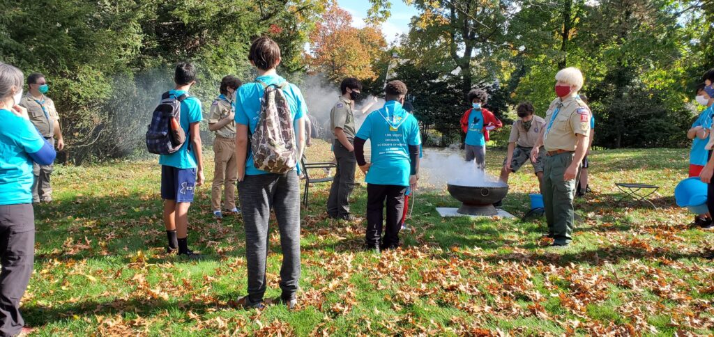 Troop 12 Montclair at a socially distanced camp fire 2020